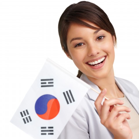 A Lady Holding a Korean Flag with a Big Smile