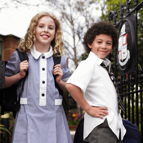 Two School Kids in School Uniforms