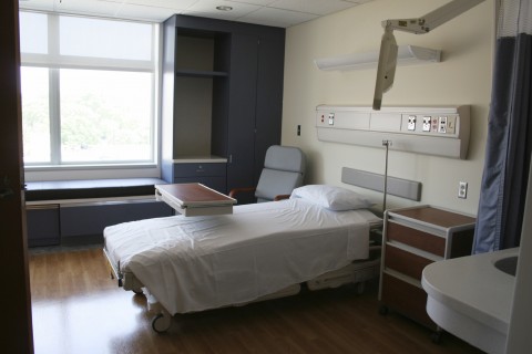 Hospital room with a bed and medical equipment