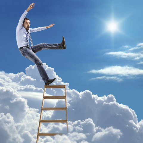 man on the top rung of a ladder in the sky, about to topple off