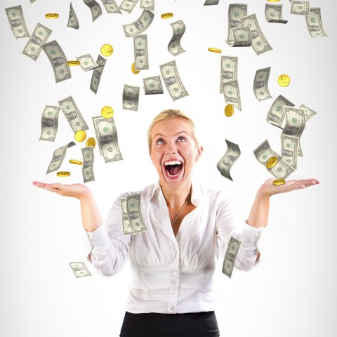 A Blond Woman in a White Shirt Is Laughing, with Money Falling from the Sky