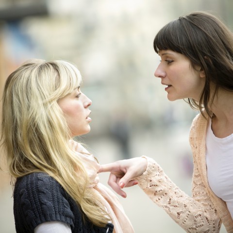 Woman Talking Down to Another Woman
