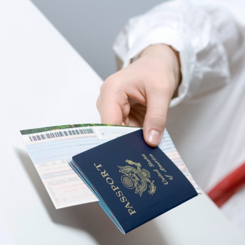 A Person Showing Their Passport