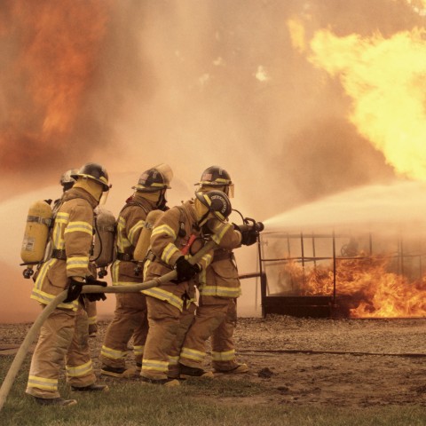 Firemen Putting Out a Fire