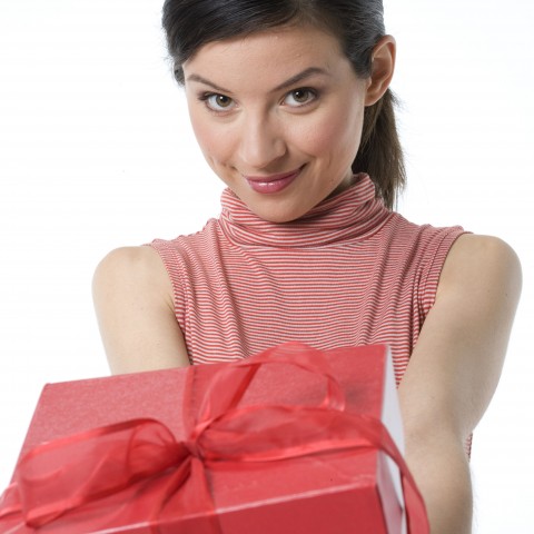 Woman Holding Out a Gift