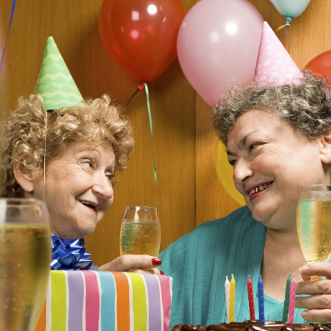 two old ladies celebrating a birthday together