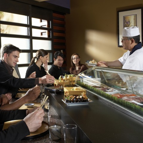 Group of People Eating Out