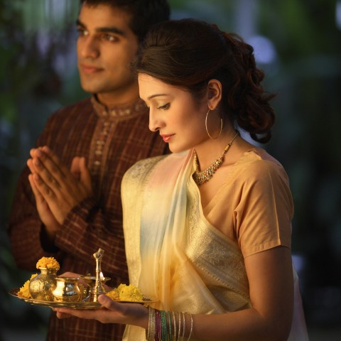 People Visiting a Temple