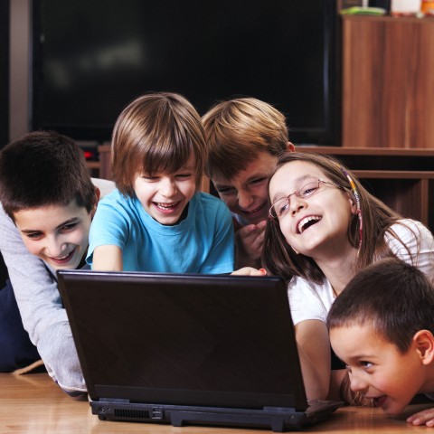 Kids Laughing Watching Computer Screen