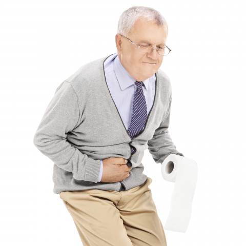 An Old Man Suffering from Pain in His Stomach