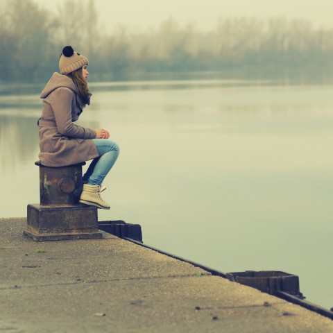 Woman Sitting Alone