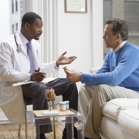 A Doctor and a Patient During a Medical Consultation