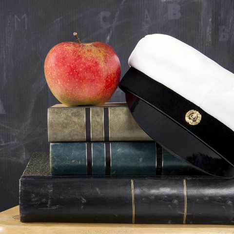 3 Books with an Apple on Top