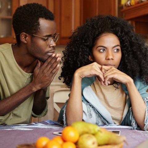 Man Apologizing to Woman