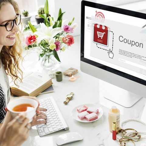 Woman using coupon online