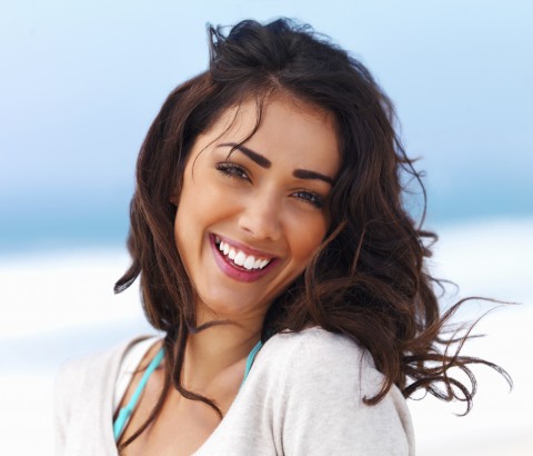 A Woman Smiling for the Camera