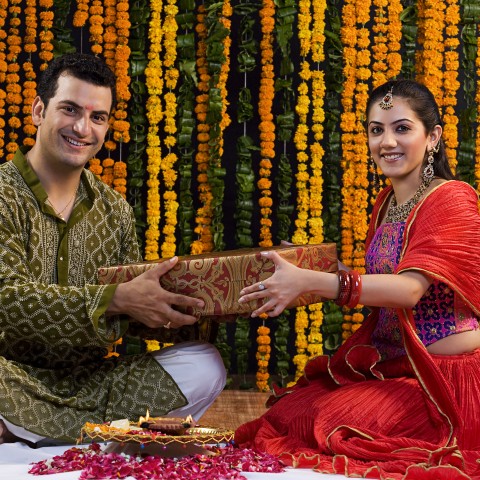 A Brother and Sister Exchanging Gifts for the Hindu Celebration of Bhai Duj