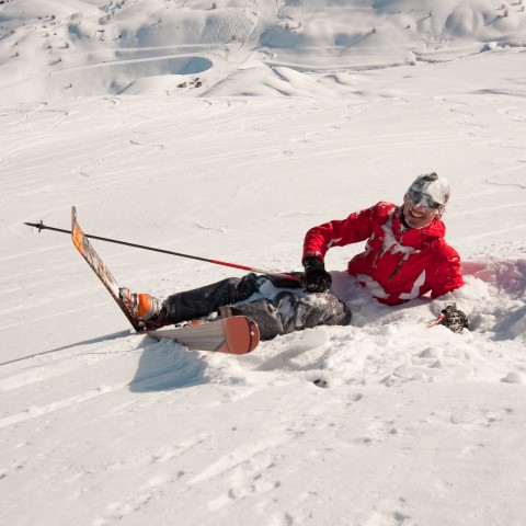 Skier Sitting in the Snow