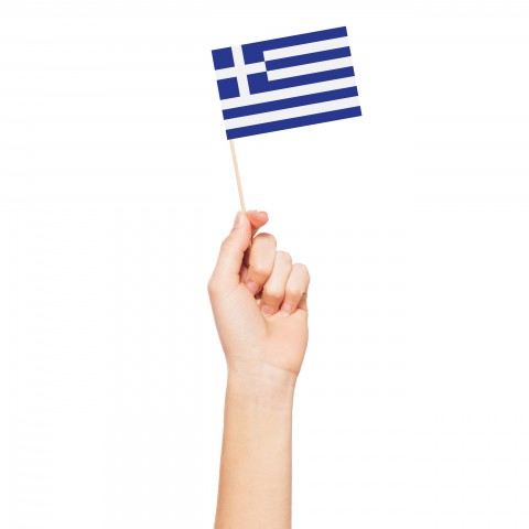 A Hand Holding a Small Greek Flag