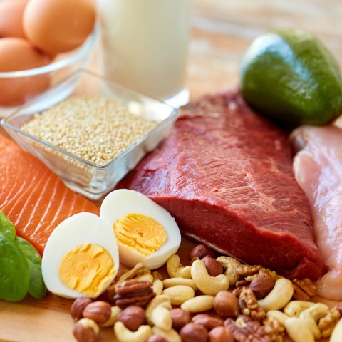 Food Is Visible on a Table, Eggs, Meat, Nuts, Salmon, Etc.