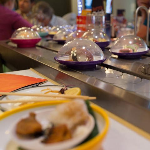 Upclose Shot of Plates at a Kaiten-zushi (Rotating Sushi) Restaurant