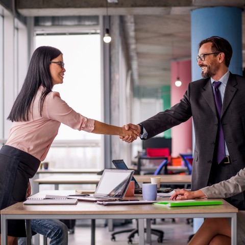 two people shaking hands