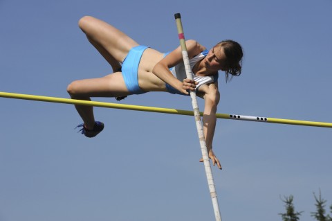 Woman pole vaulting