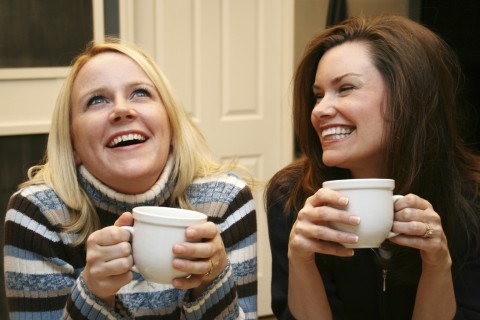 Two Women Chatting with Hot Drinks