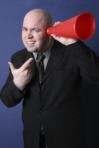 Man with Bullhorn to Ear