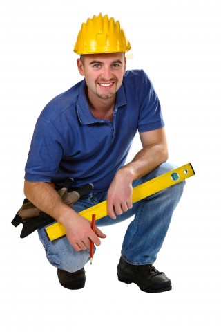 A Smiling Person with Some Equipment in His Hands, Signifying a Blue-collar Job