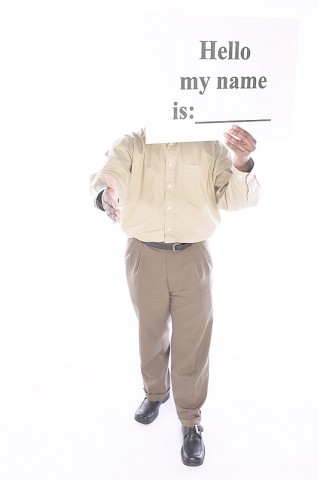 Man Holding Up “Hello My Name is” Sign