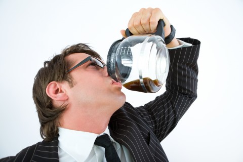 Man Drinking Coffee from the Coffee Pot