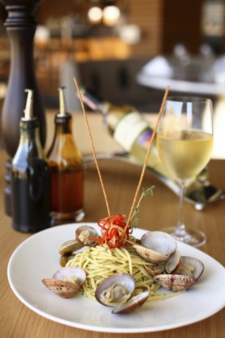 Wine glasses and place settings at an Italian restaurant