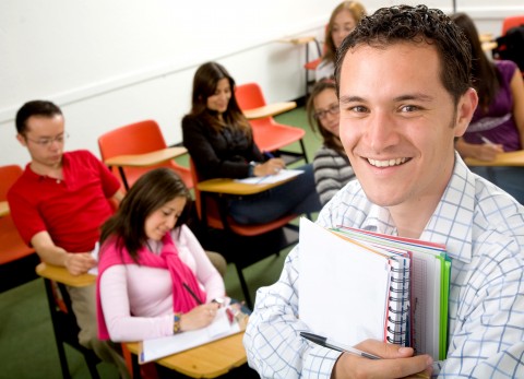 A Teacher and His Students in a Classroom