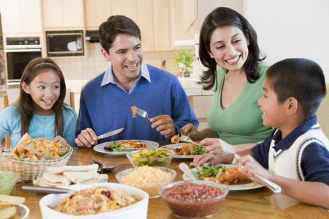 A Family Sitting Down to a Nice Dinner