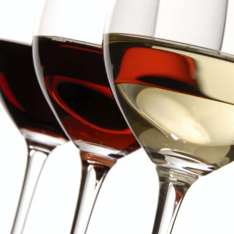 Three Different Glasses of Red And White Wine