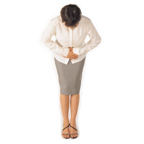 a Thai lady bowing