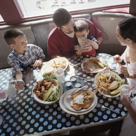 A Family Eating Out at a Restaurant