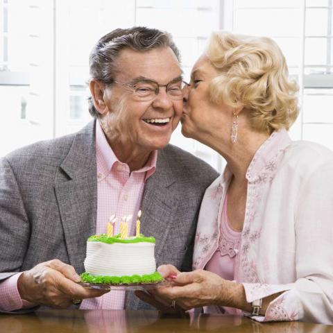 Old Woman Kissing Old Man’s Cheek