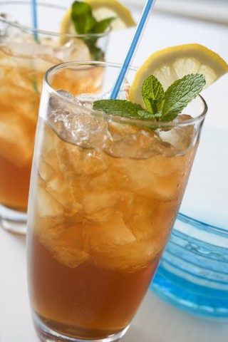 Two Glasses of Iced Tea with Lemon Wedges