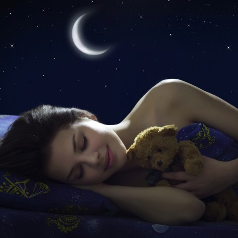 Girl sleeping; moon and starry sky