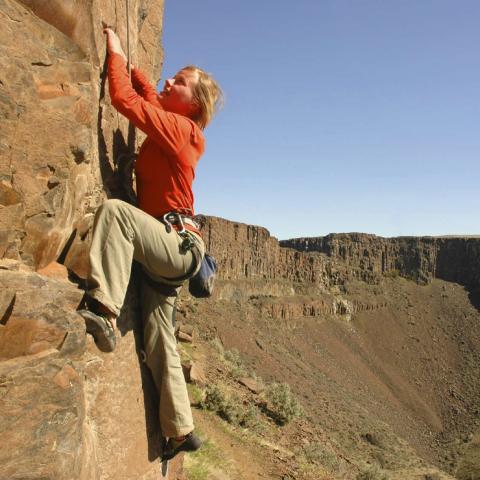 Woman Rock Climbing