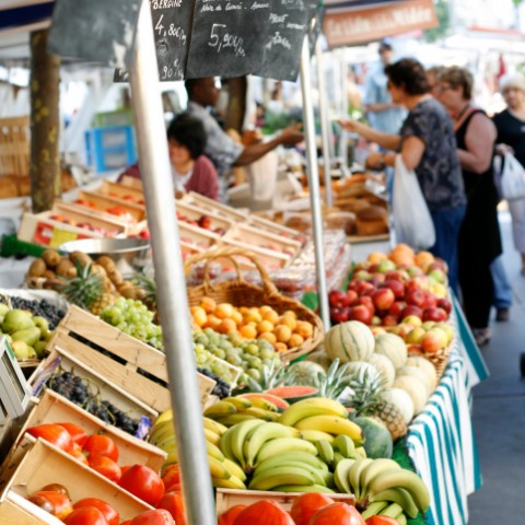 A Fruit Stand On A Street Market